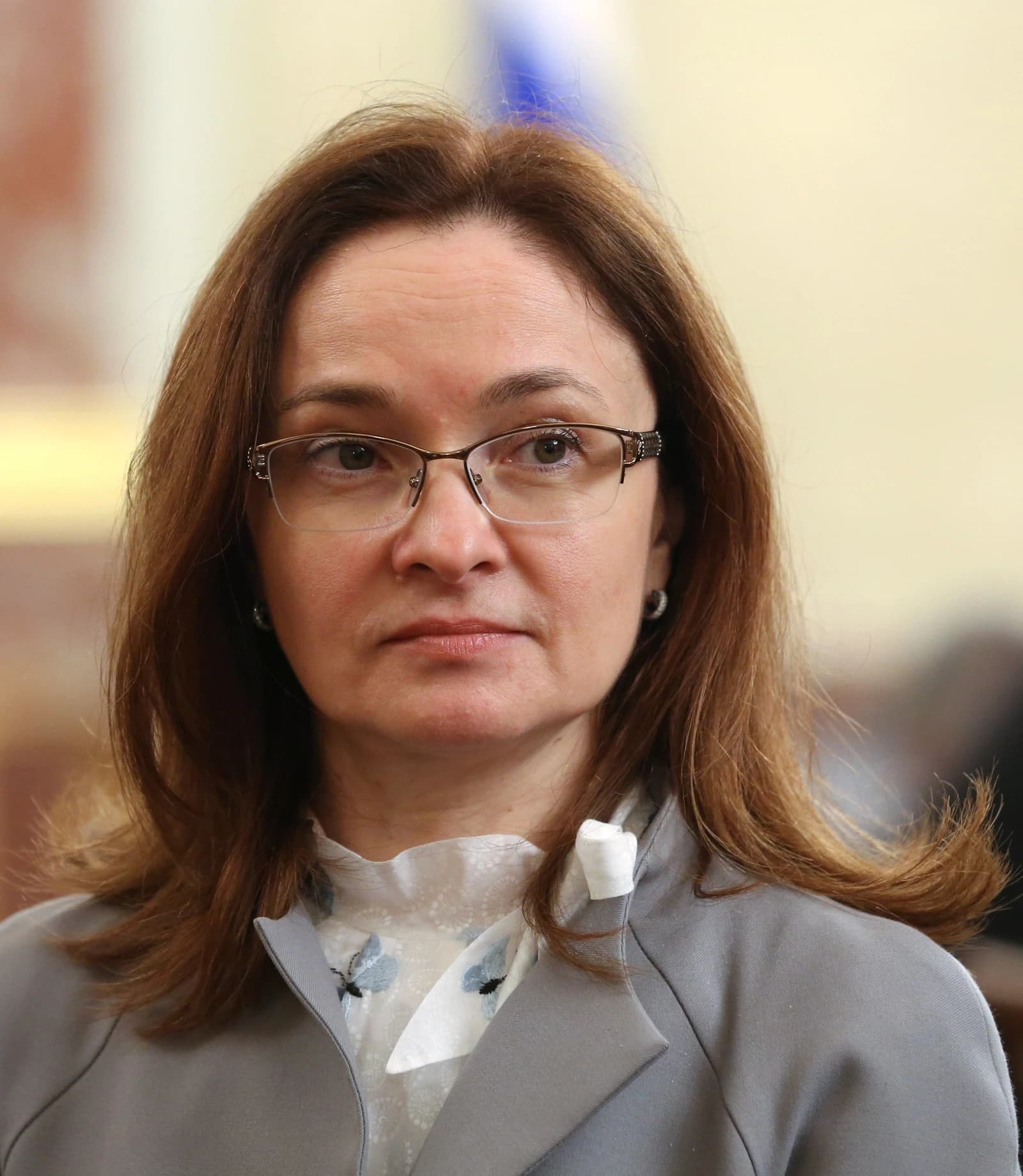 Elvira Nabiullina, Governor of the Bank of Russia, posing for a portrait indoors.