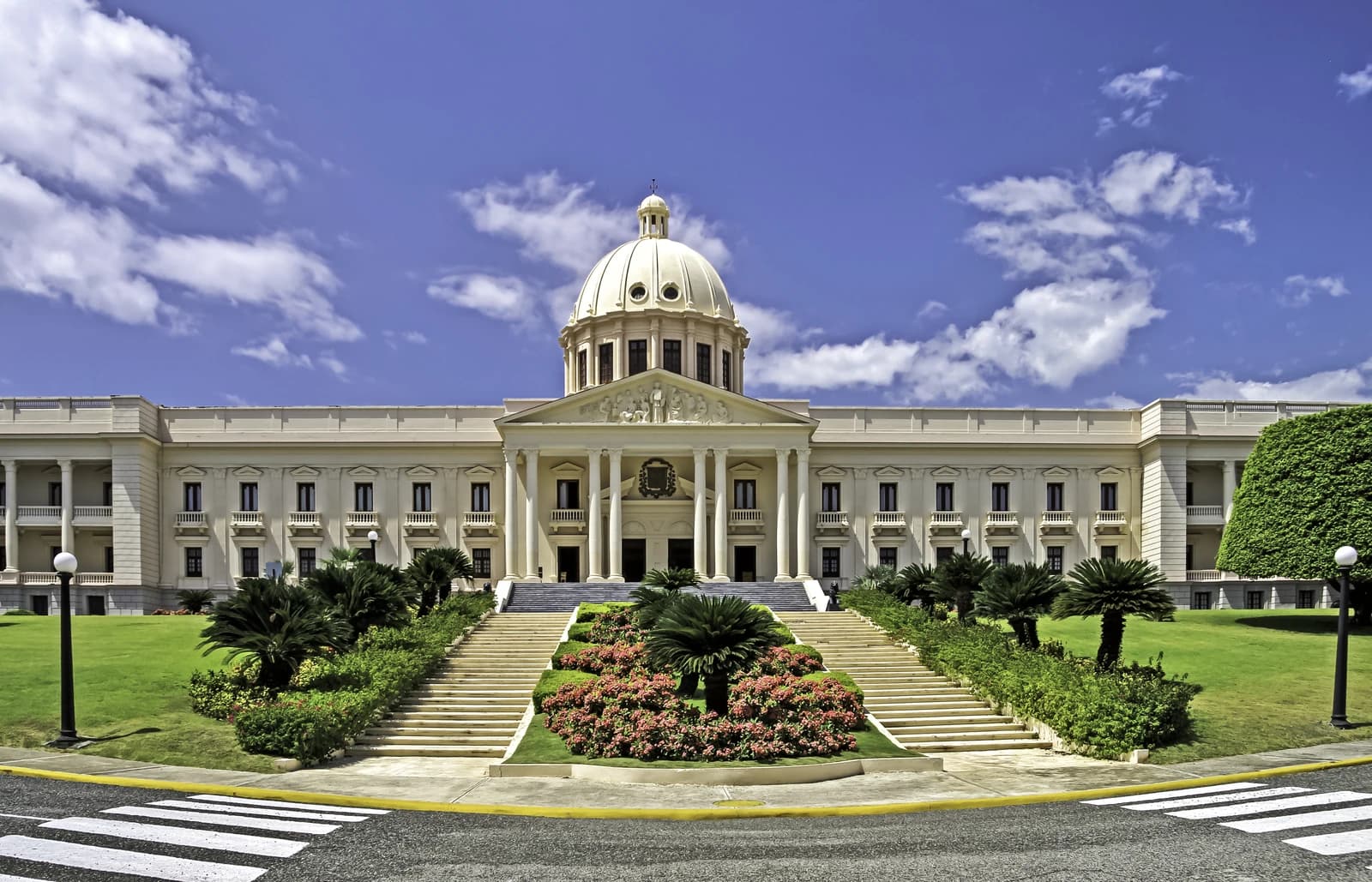 The National Palace in Santo Domingo, Dominican Republic, under a blue sky.