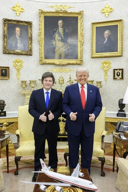 President of Argentina Javier Milei and former US President Donald Trump stand together in a room.