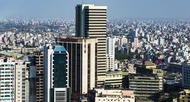 An aerial view of the city of Dhaka, Bangladesh with many buildings.