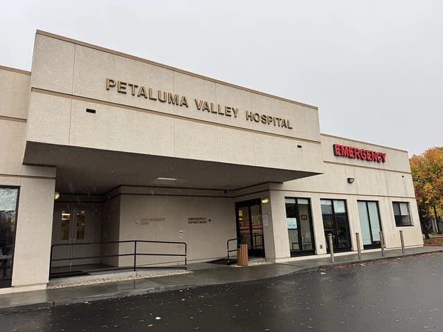Exterior view of Petaluma Valley Hospital with the emergency entrance.