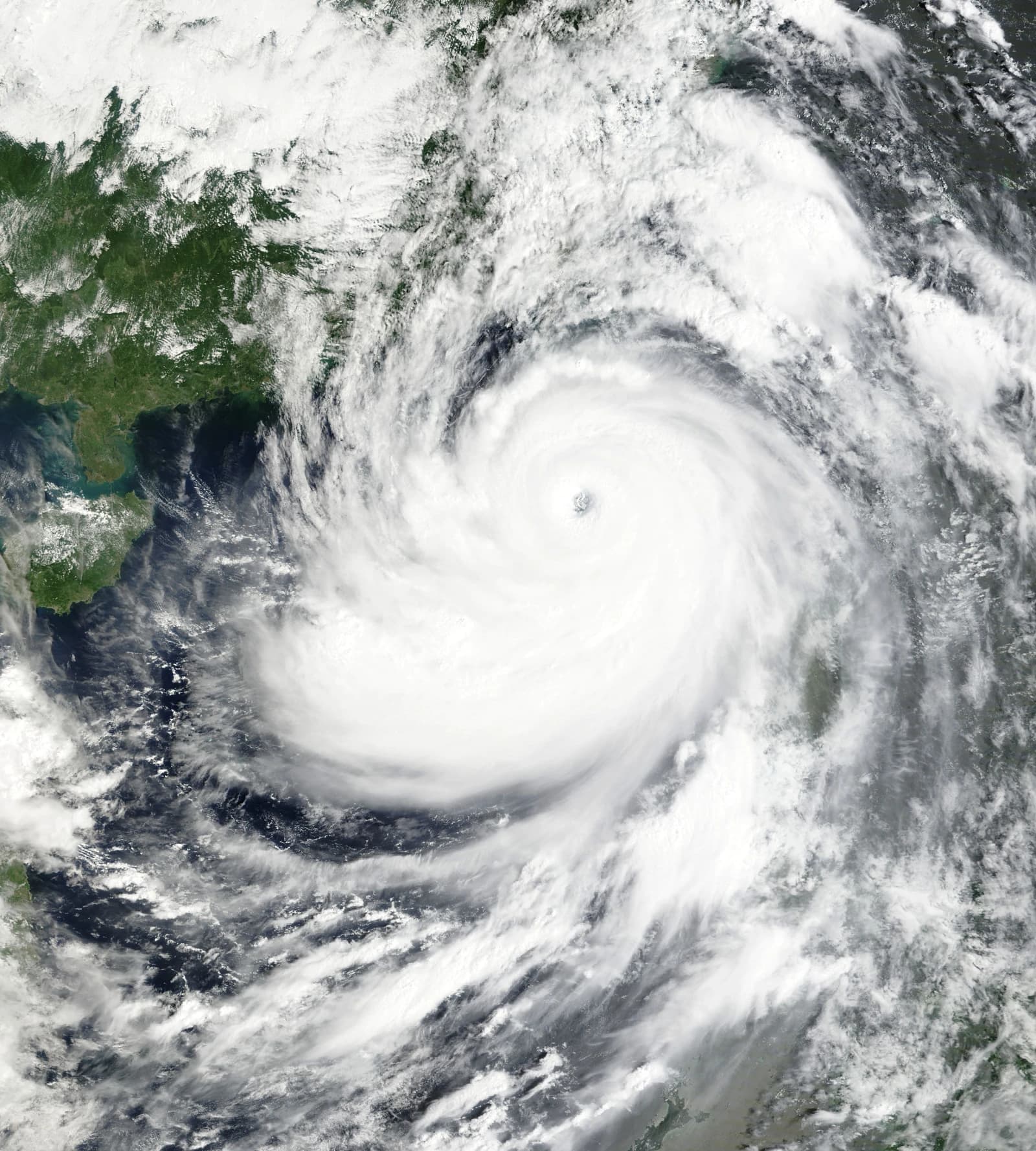 Satellite image showing the swirling clouds and distinct eye of Typhoon Ragasa.