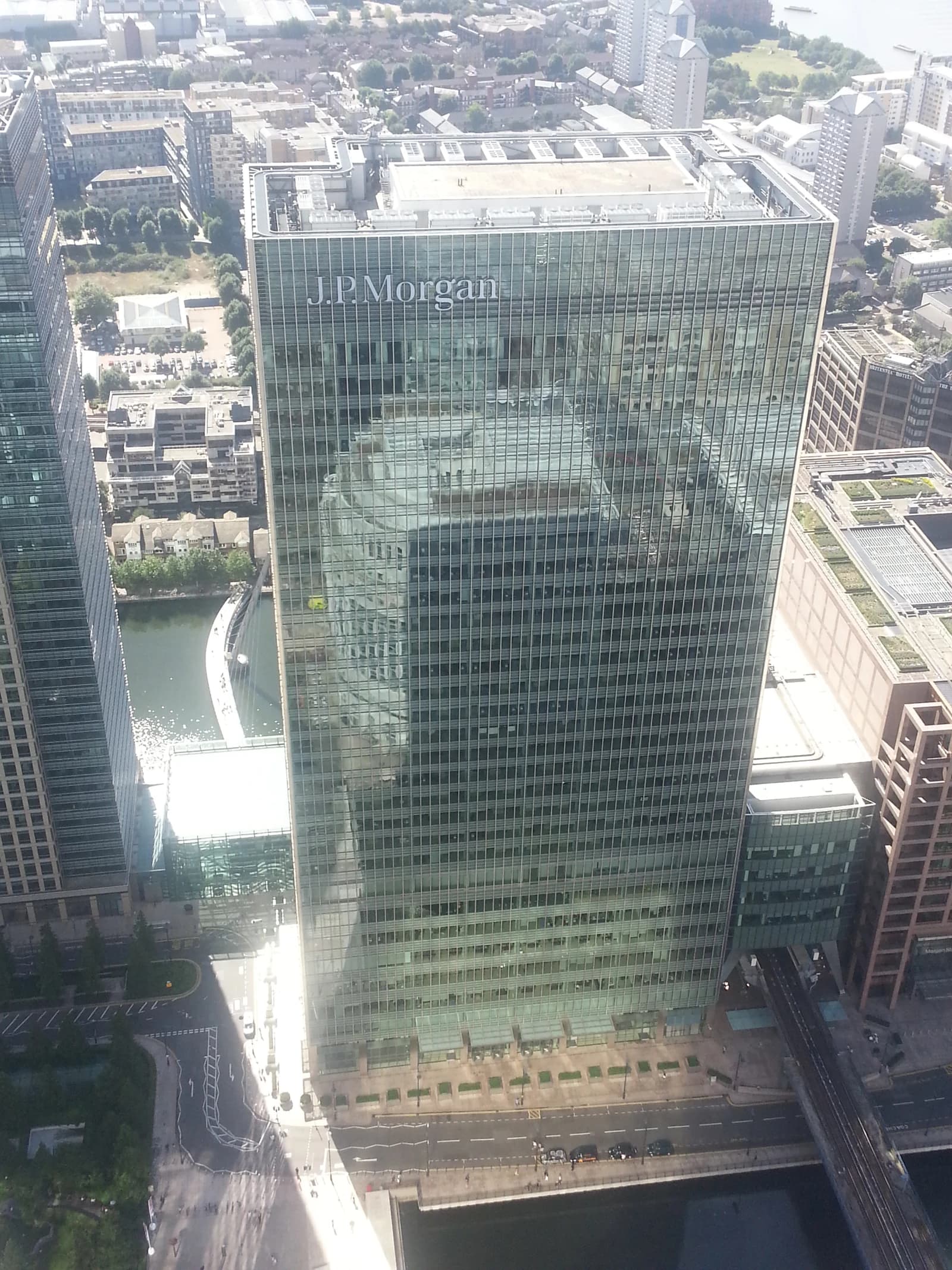 Aerial view of the glass-clad JP Morgan building in London's Canary Wharf district.