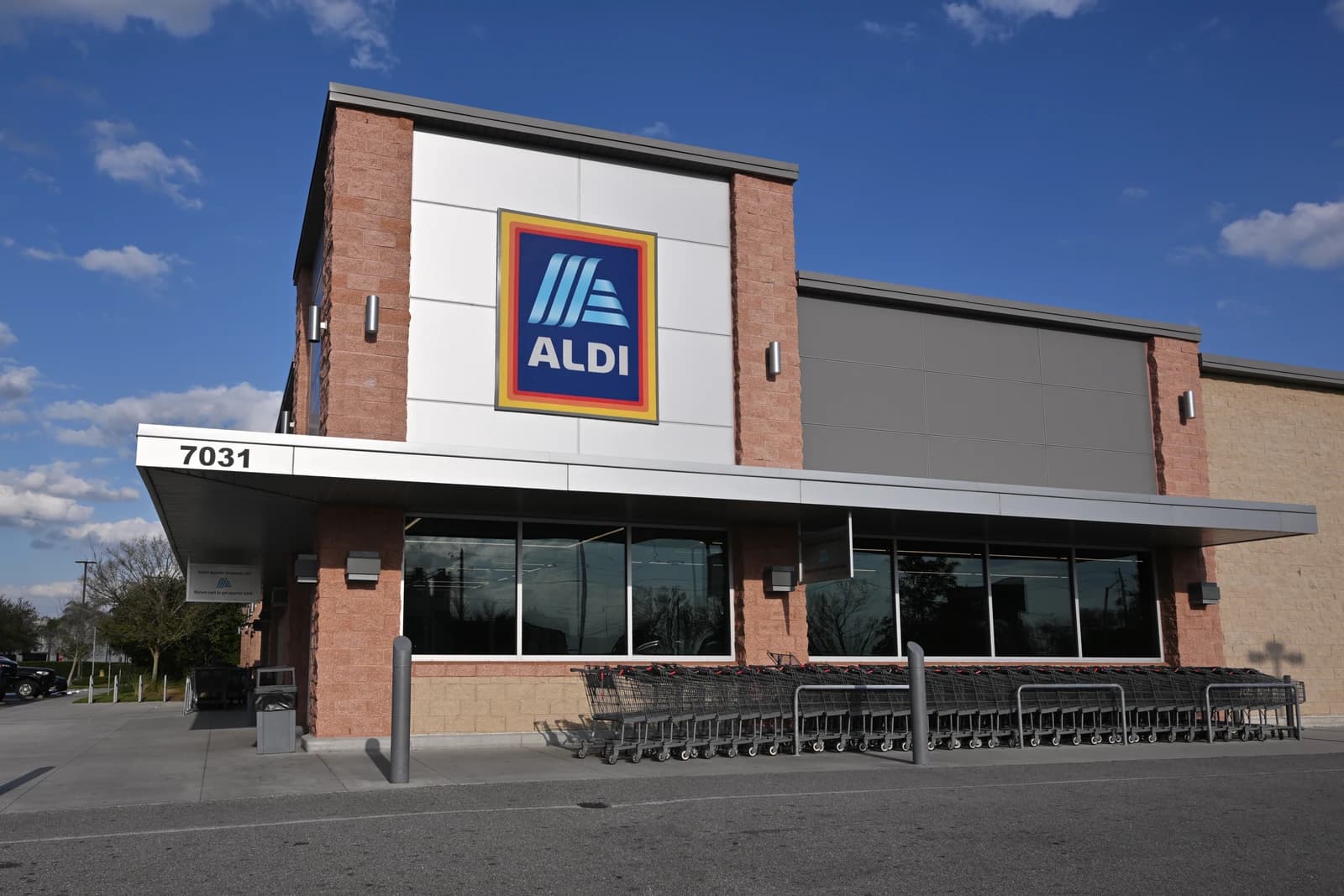 Exterior of an Aldi supermarket with its logo visible on the facade.