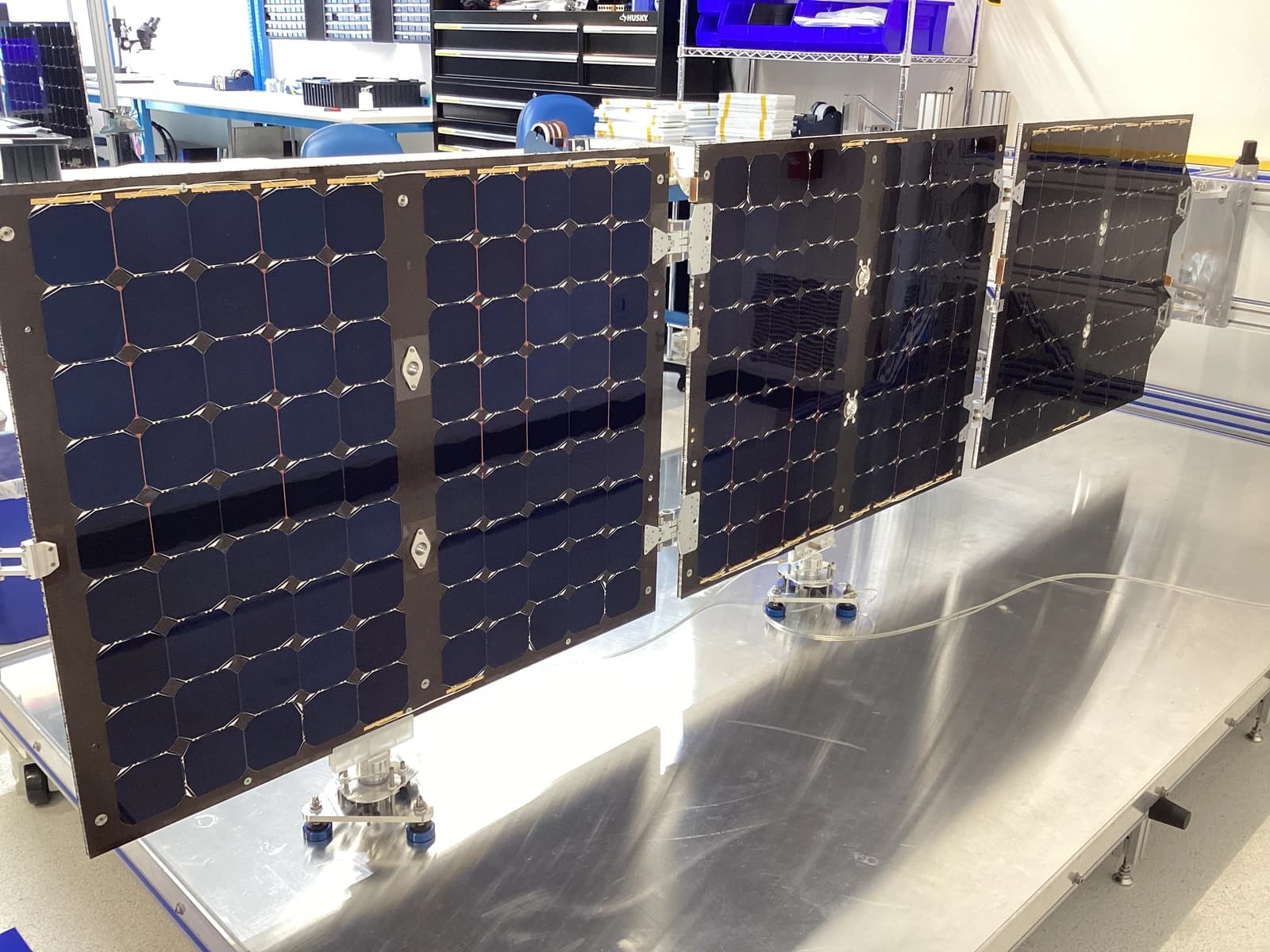 NASA’s Pandora Mission solar panels deployed during a test in a laboratory.