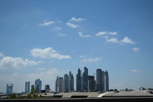 Skyline of tall, modern high-rise buildings in the Puerto Madero district.