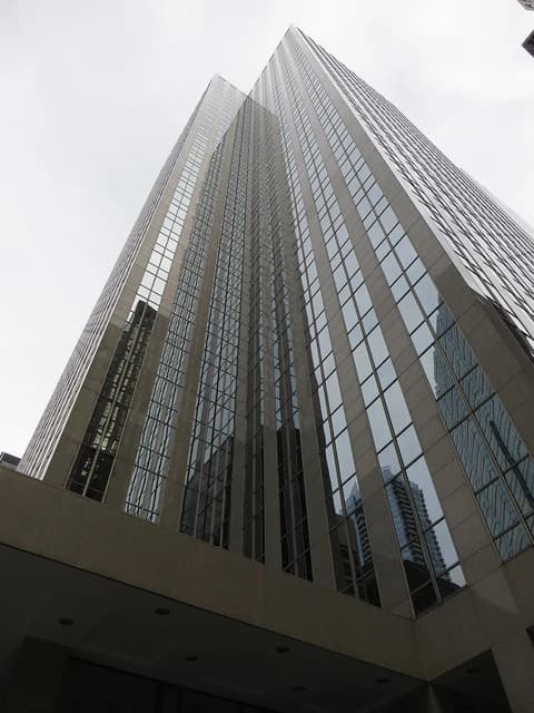 Glass and concrete facade of the Exchange Tower building in downtown Toronto.