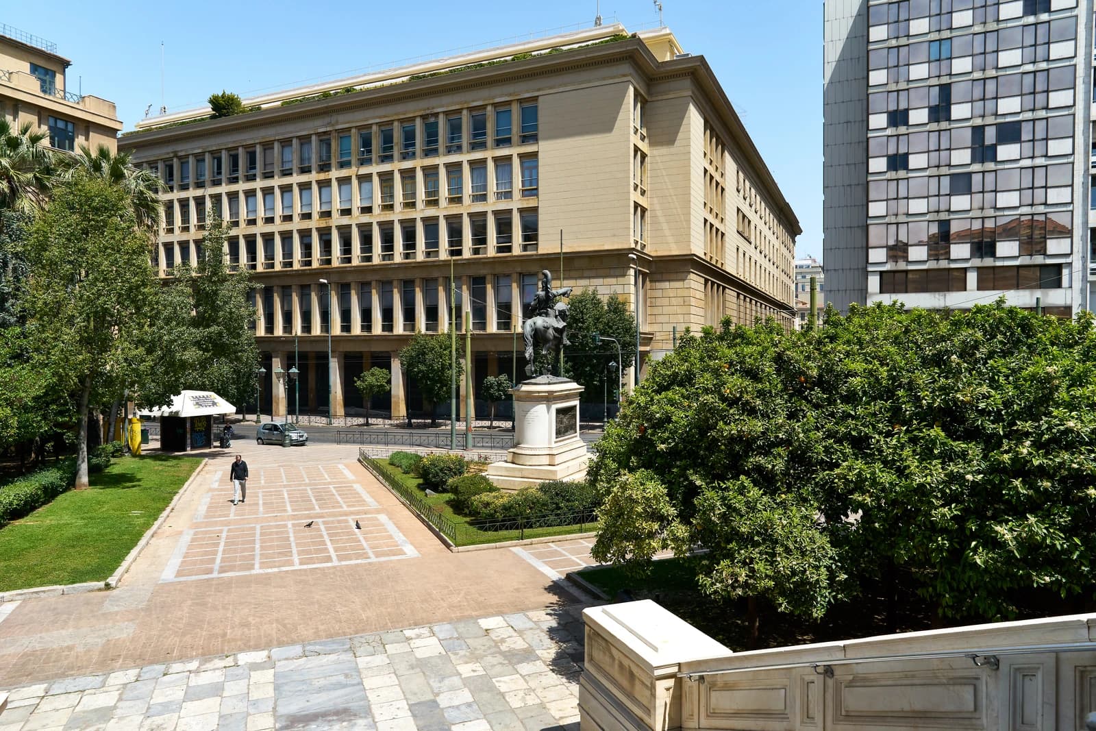 The Bank of Greece building and the Old Parliament building on Stadiou Street in Athens.