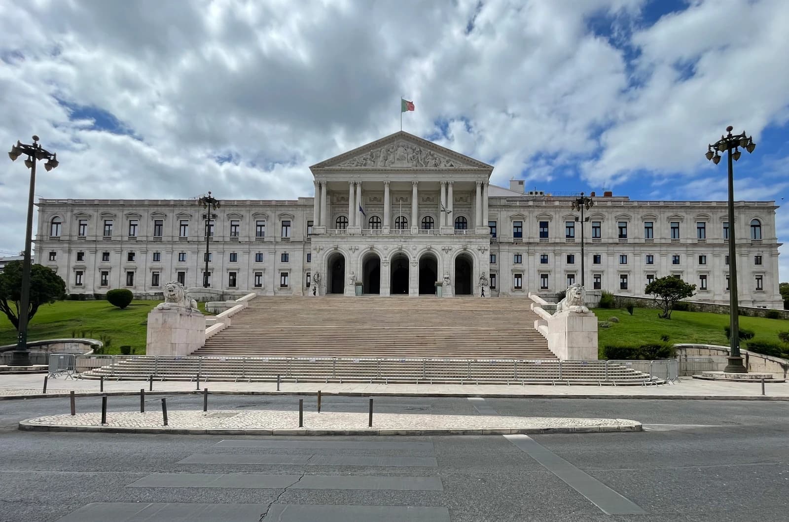 Palácio de São Bento, Portugal's Parliament building, featuring a grand staircase and columns.