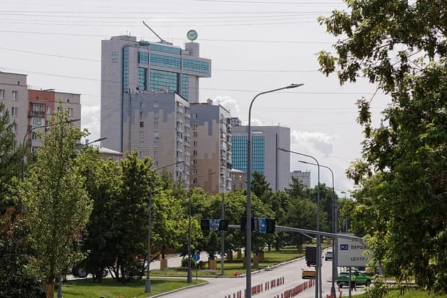 Sberbank building on Gagarina Square in Moscow, seen from a distance across a street.