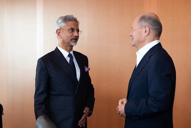 S. Jaishankar, External Affairs Minister of India, speaks with German Chancellor Olaf Scholz.