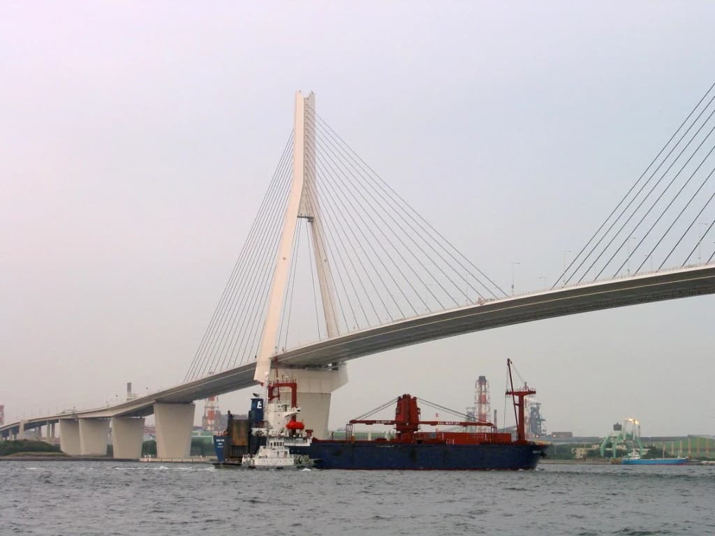 Ship departing Yokohama Harbor carrying Experiment Logistics Module Pressurized Section.