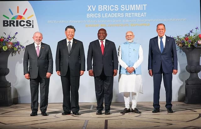 Heads of state and government representatives pose for a group photo at the BRICS Leaders Retreat Meeting in Johannesburg.