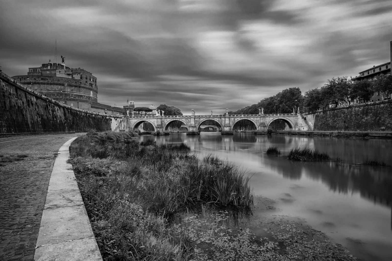 Castel Sant'Angelo and Ponte Sant'Angelo across the Tiber River in Rome.