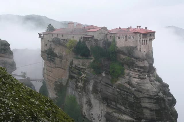 Varlaam Monastery built on a tall rock formation in Meteora, Greece.