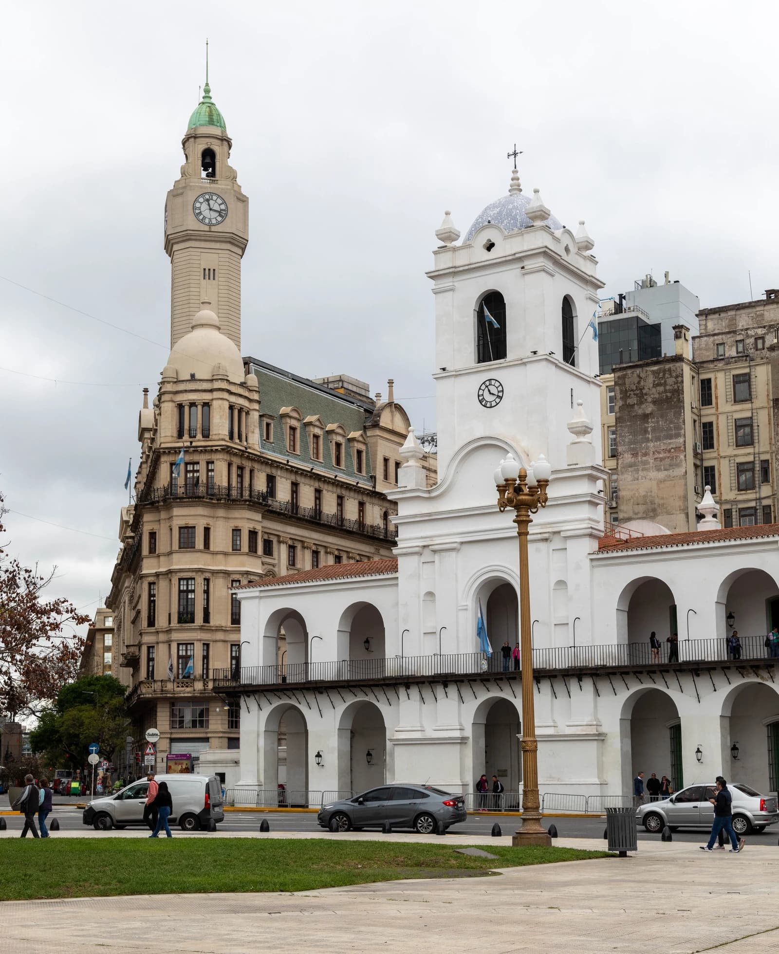 View of the white Cabildo building and the beige City Legislature Palace in Buenos Aires.