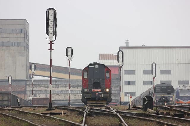 Locomotive pulling freight wagons at Katowice Wujek coal mine.