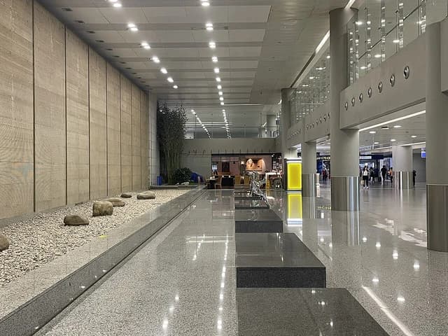 Chinese Garden Decoration featuring rocks and bamboo at Shanghai Pudong International Airport Terminal 2.