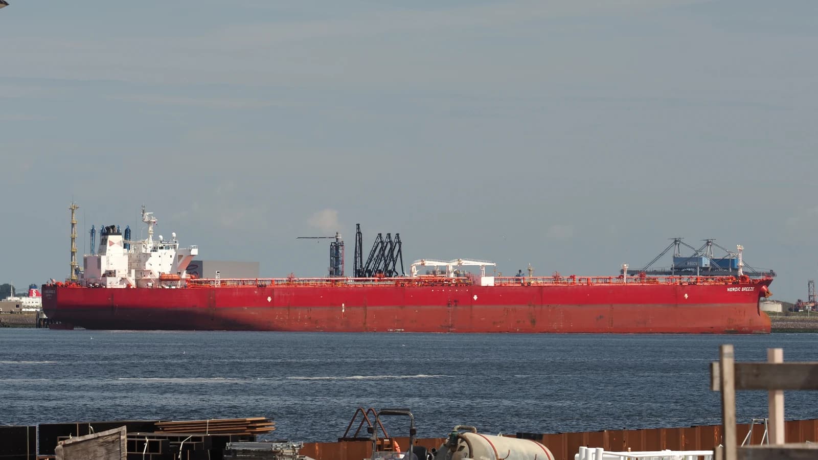 Oil tanker Nordic Breeze navigating waters in the Port of Rotterdam.