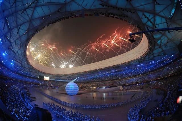 Fireworks light up the stadium ceiling during the 2008 Beijing Olympic opening ceremony.