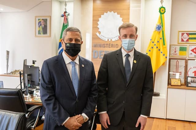 Jake Sullivan, US National Security Advisor, stands next to a Brazilian official.