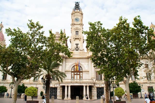 Ajuntament de València building, a grand stone structure with a prominent clock tower.