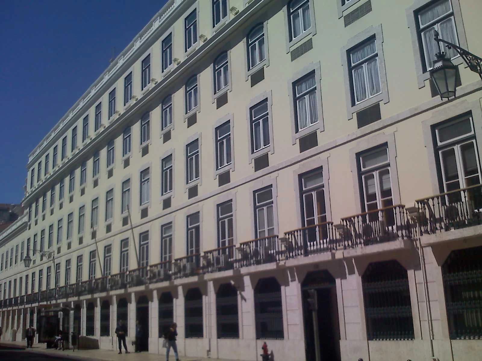 Exterior view of Banco de Portugal headquarters building on a sunny day.