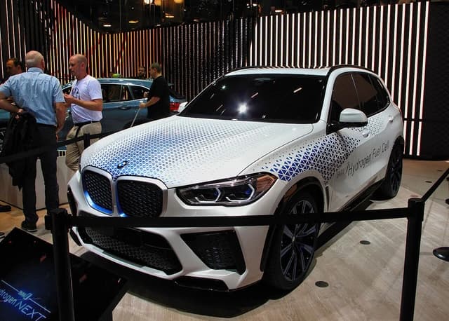 BMW X5 i Hydrogen Next Concept car with unique blue and white patterning on display.