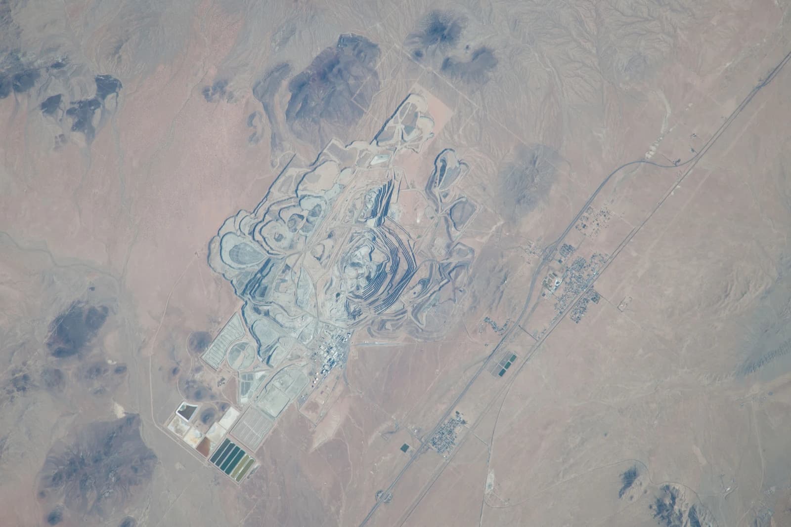 Aerial view of the former US Borax mine, showing large open pits and industrial facilities.