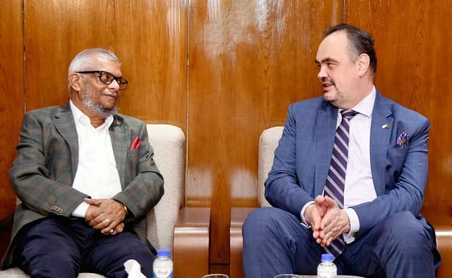 Brent T Christensen, US Ambassador to Bangladesh, and Ariful Haque Chowdhury, Minister of Labor and Employment, in conversation.