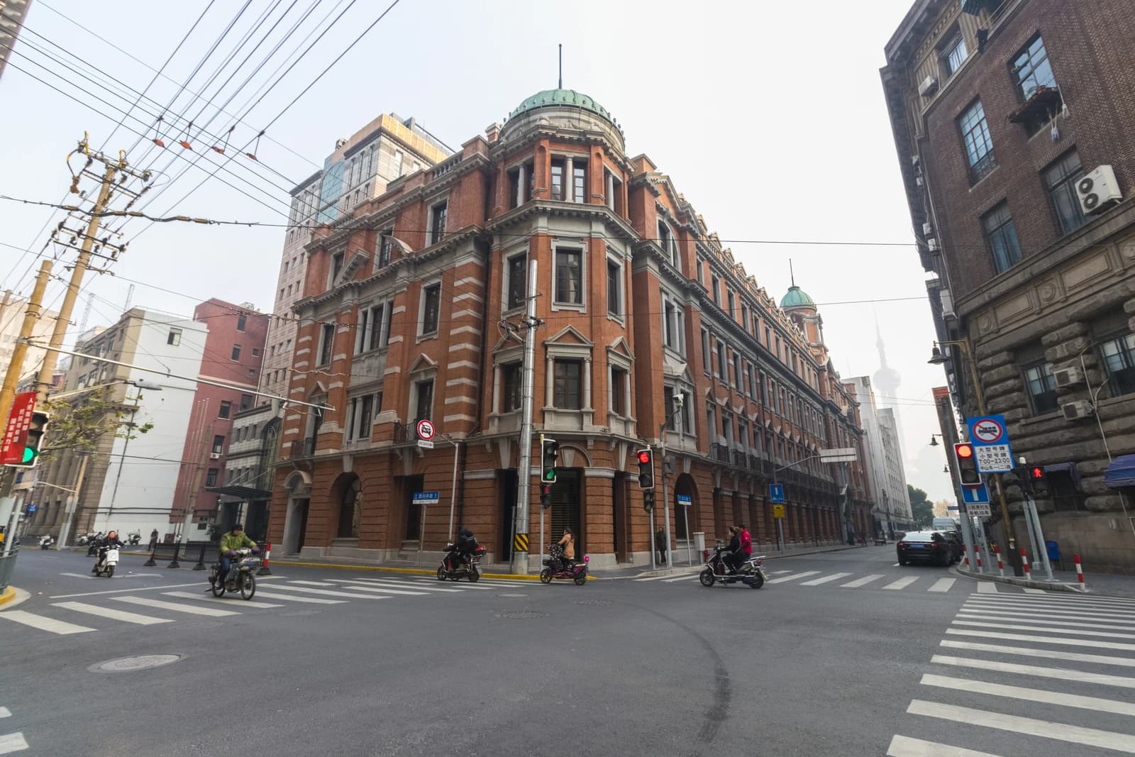 The historic First Headquarters of Bank of China building stands on a Shanghai street corner.