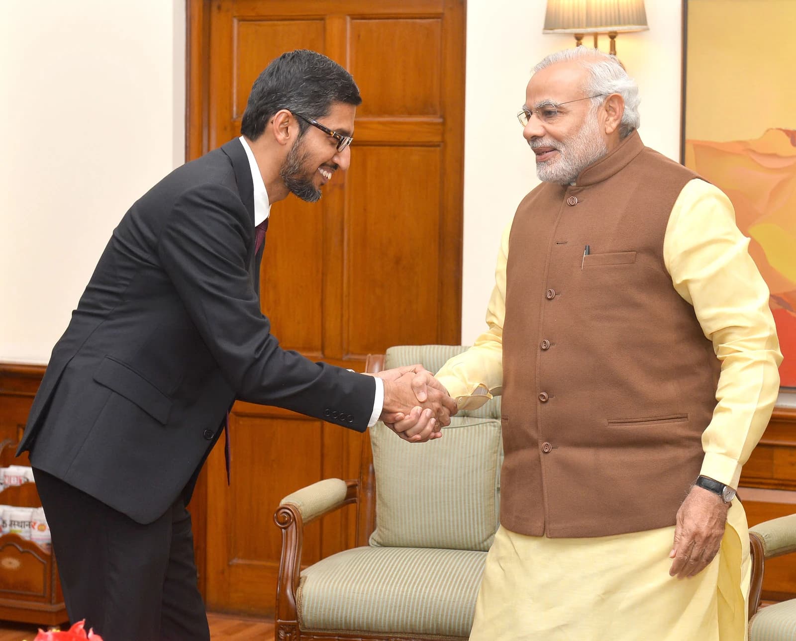Sundar Pichai, CEO of Google, shakes hands with Prime Minister Narendra Modi in New Delhi.