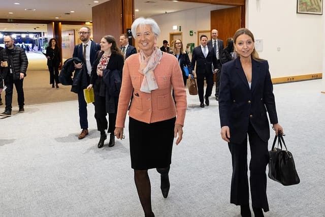 Christine Lagarde, President of the European Central Bank, walking with Aurore Lalucq.
