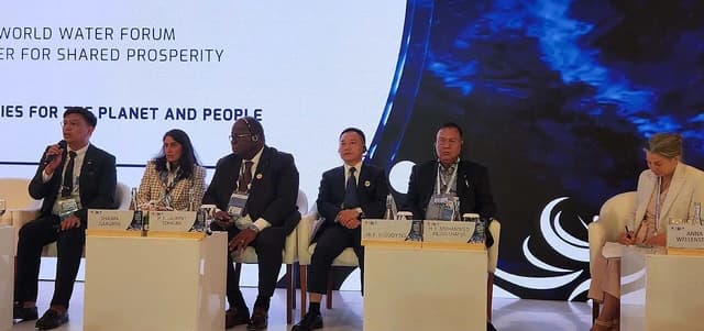 Md Abdus Shahid, Agriculture Minister, seated at a panel discussion.