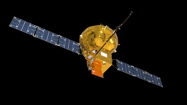 Artist's impression of the Smile spacecraft in space, golden body with solar arrays.