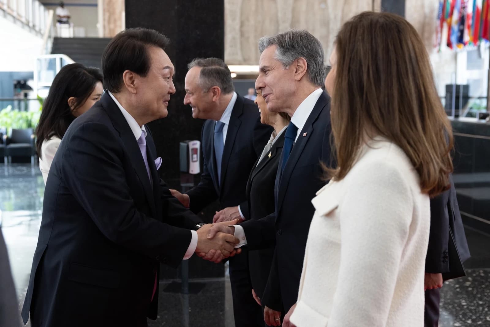 Republic of Korea President Yoon Suk Yeol shaking hands with US Secretary of State Antony Blinken.