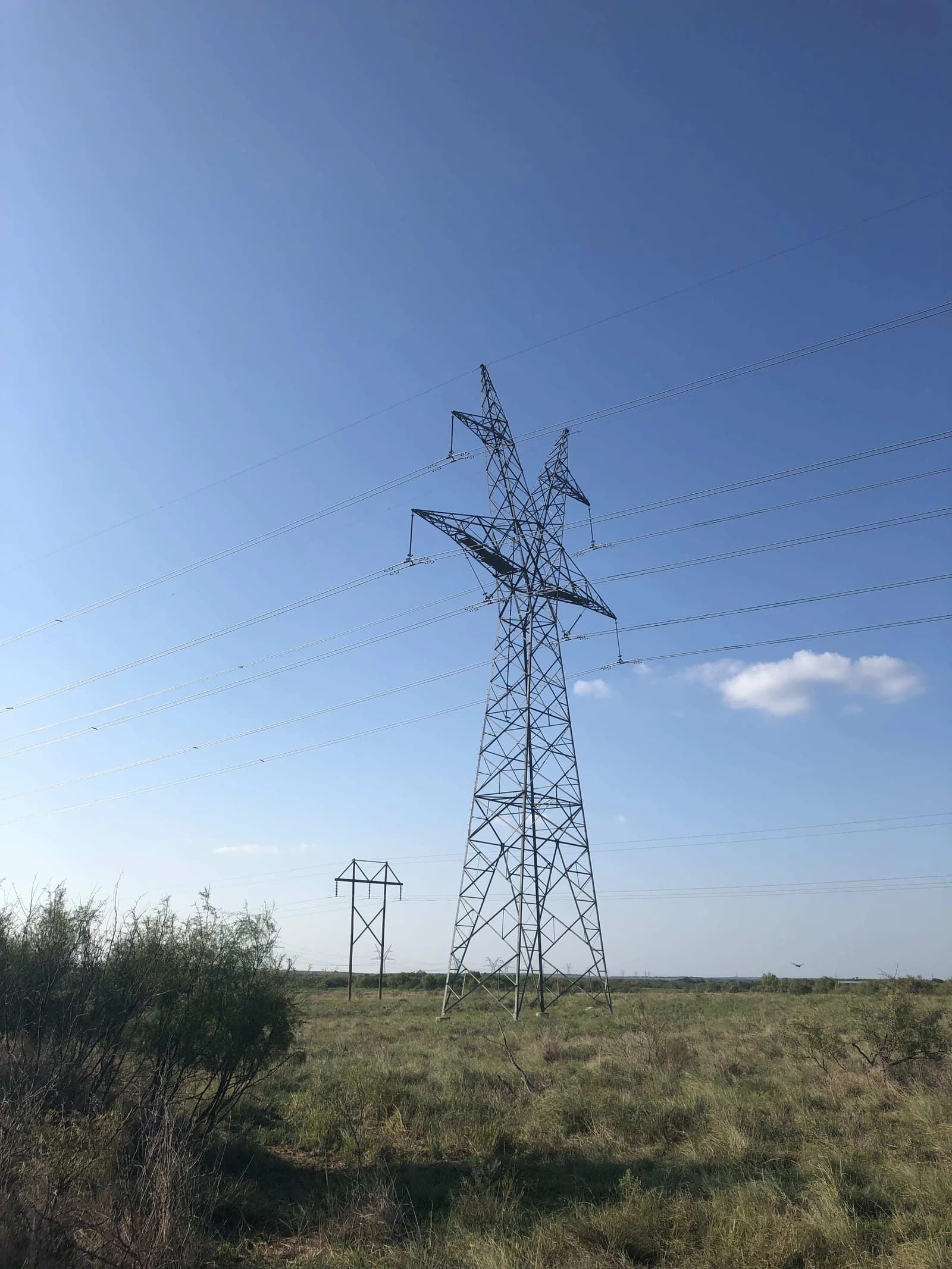 Electricity towers and lines in Clay County, Texas, within vicinity of Bowie, Texas.