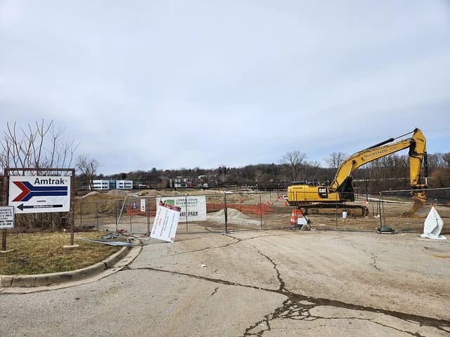 Construction machinery at the site of a former coal gasification plant.