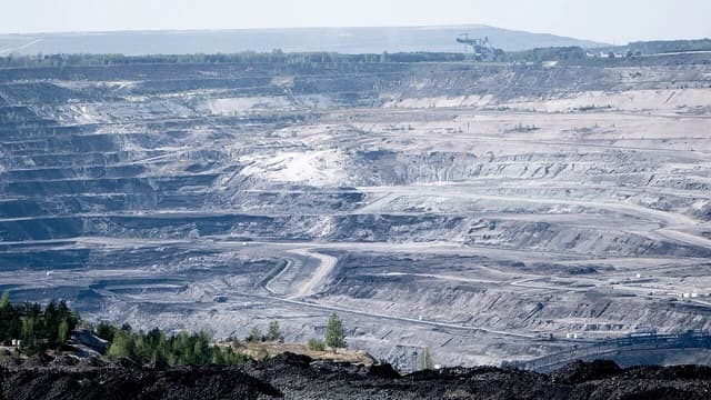 PGE Bełchatów power plant and coal mine with vast open-pit excavation.