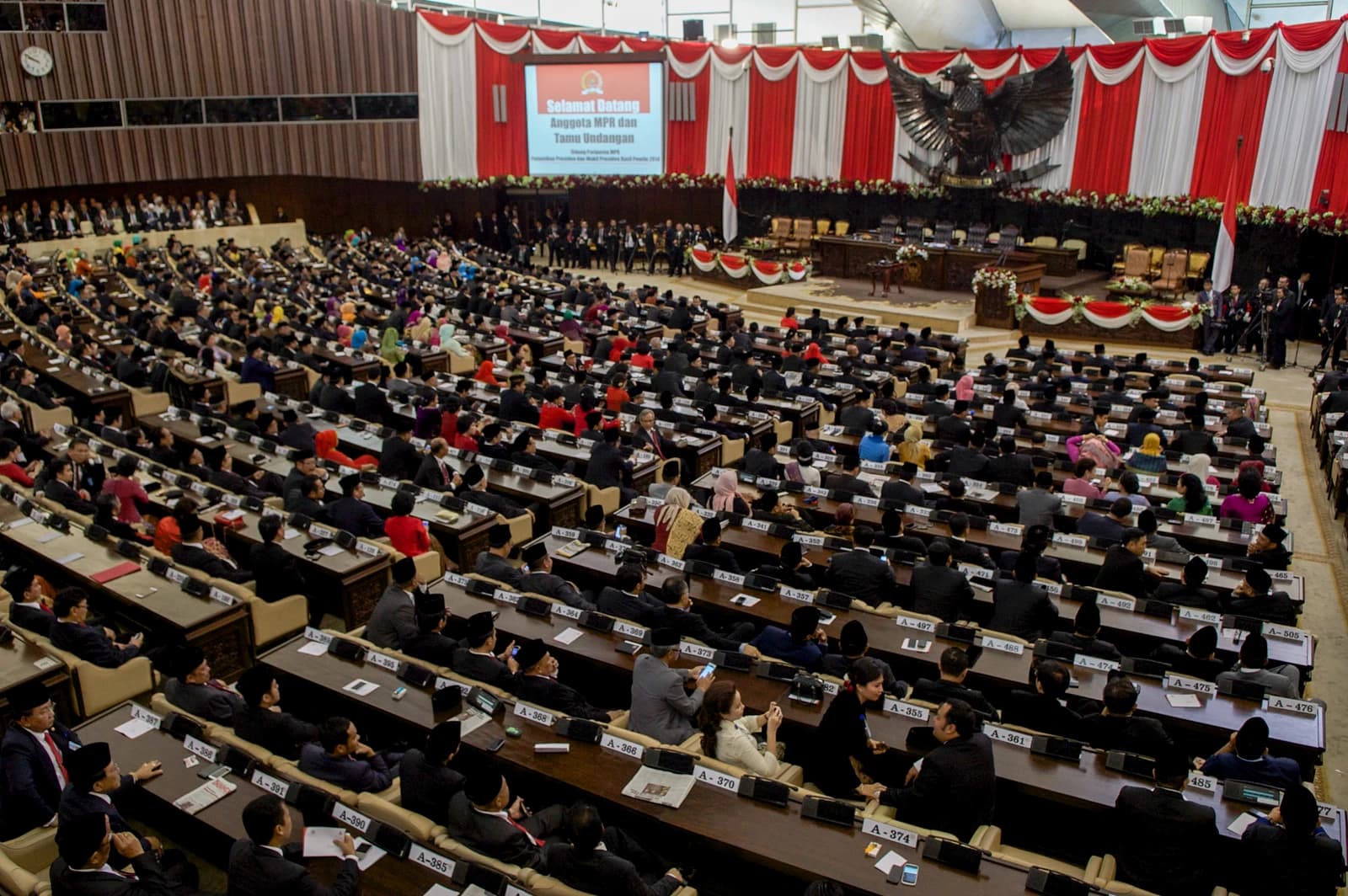 People's Consultative Assembly (MPR) plenary session room in Indonesia, filled with numerous attendees.