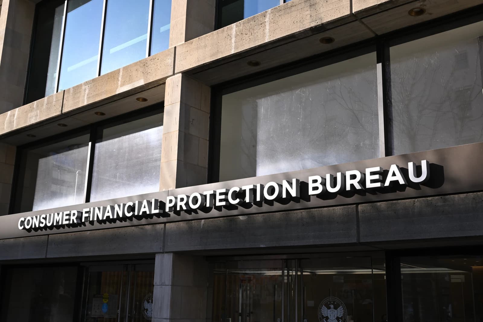 Sign for the Consumer Financial Protection Bureau building in Washington D.C.