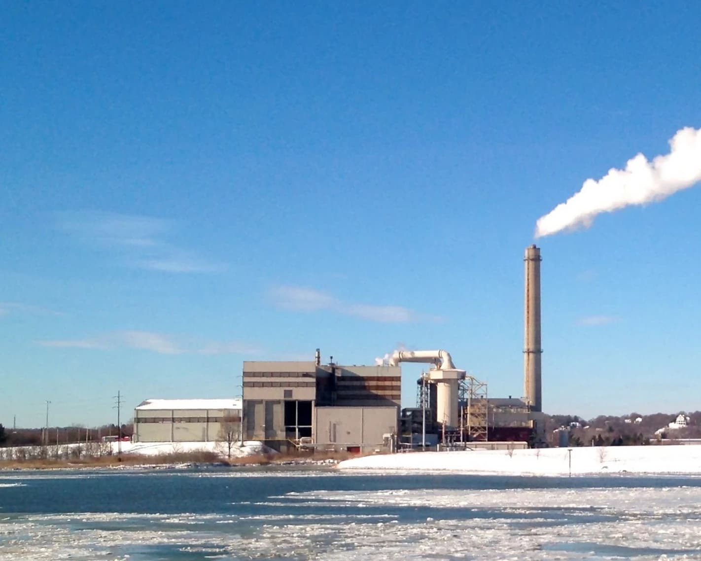 Exterior of the Wheelabrator Waste-to-Energy Plant in Saugus, Massachusetts, on a winter day.
