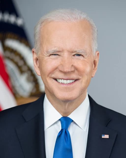 Joe Biden, President of the United States, smiling for an official portrait.