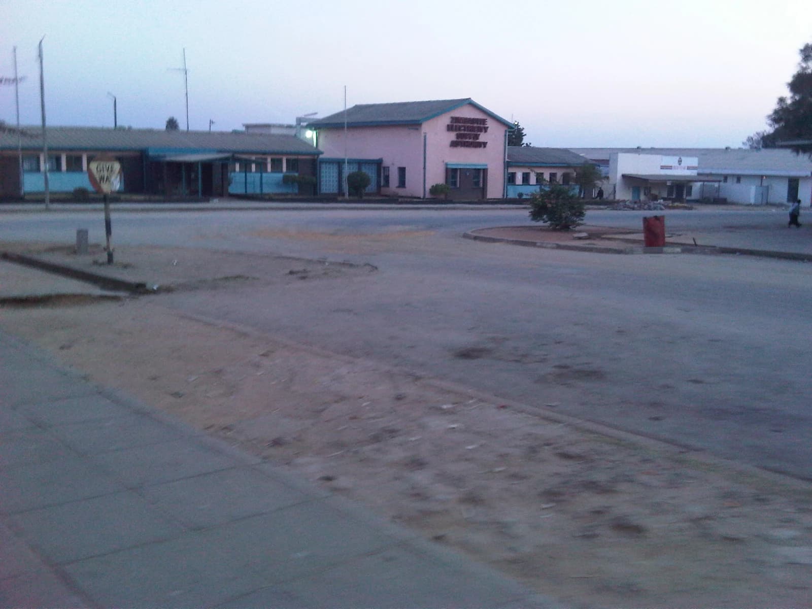 Building with text 'Zimbabwe Electricity Supply Authority' visible in Rusape.