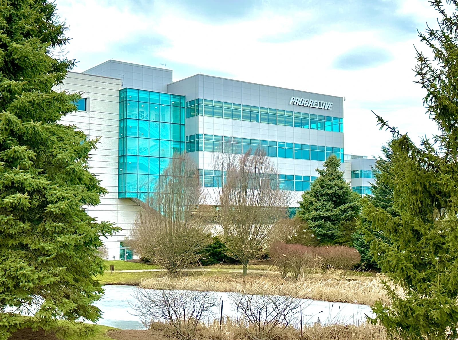 Exterior view of the Progressive Corporation Headquarters building, showing signage.