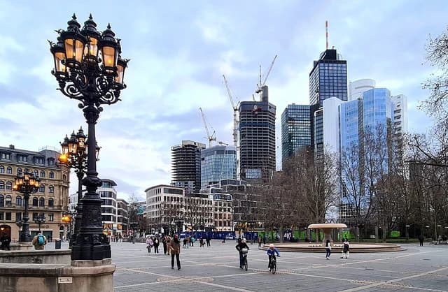 Opernplatz in Frankfurt am Main with modern buildings and historic lampposts.