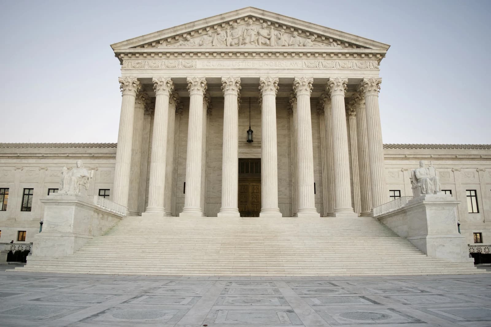 The United States Supreme Court building features classical architecture with tall columns and steps.