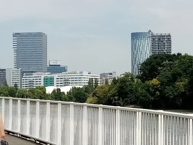 Globalworth Tower and SkyTower, modern high-rise office buildings, dominate the Bucharest skyline.