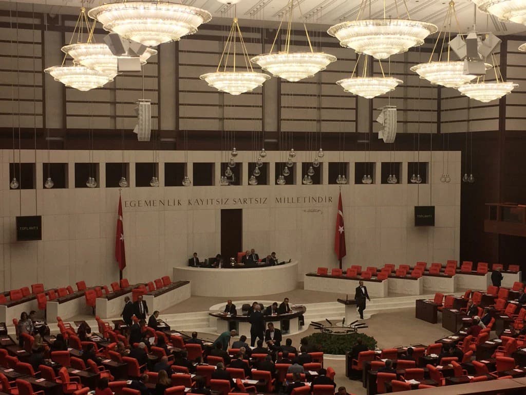 Interior of the Turkish Grand National Assembly with members present during a session.