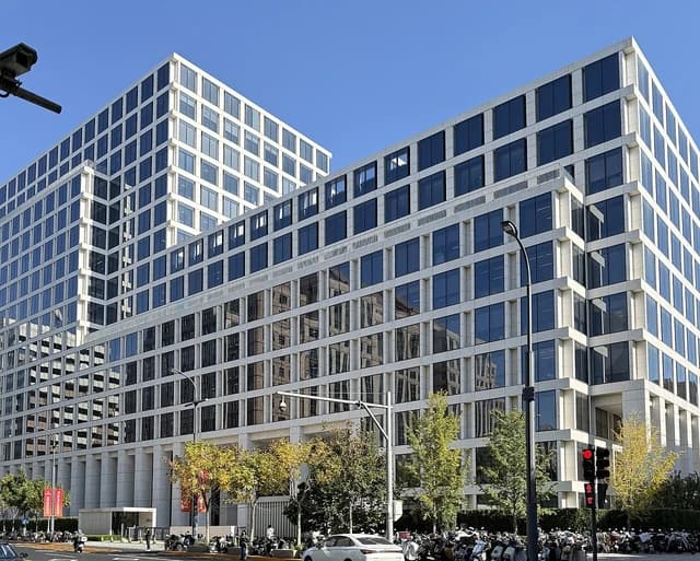 Modern high-rise building with a grid of windows, People's Bank of China.